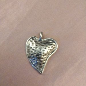 Silver hammered heart pendant xoxo imprint
